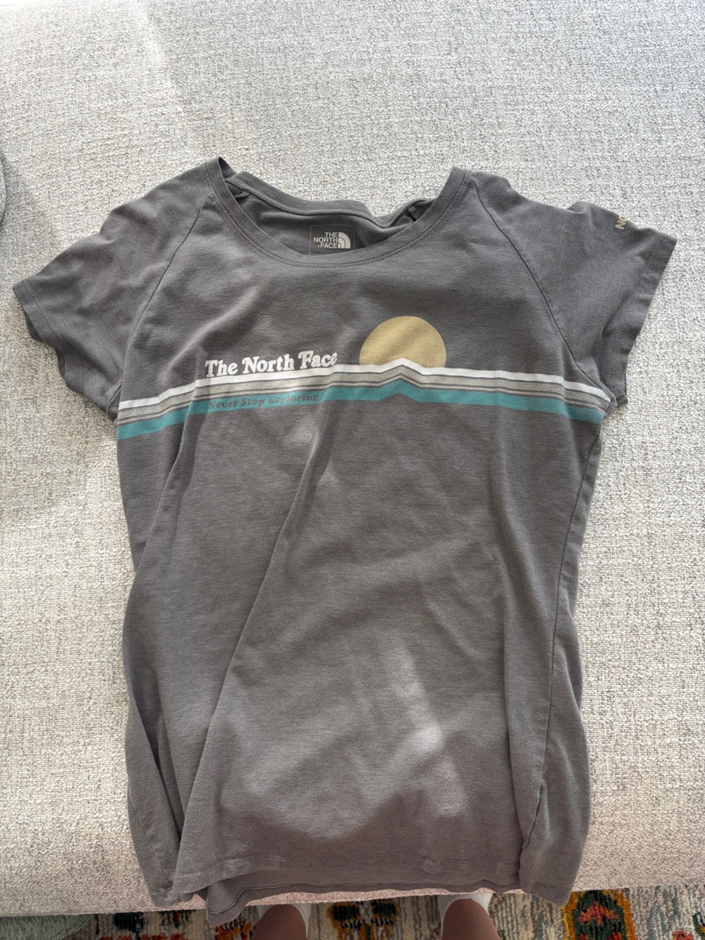 The North Face Women’s Short-Sleeve Gray Tee with Teal and White Stripes